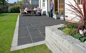 bold large format black pavers lined with smaller light grey pavers